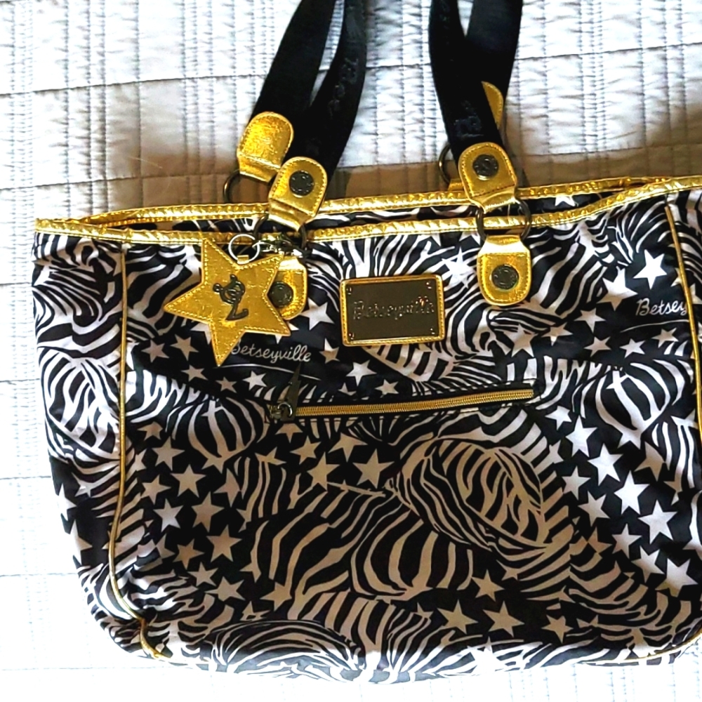 Betsyville bag, black, white and gold with stars, screws and zebra print